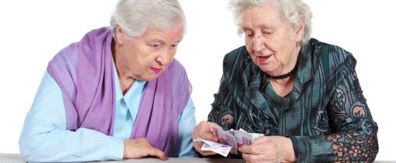 Two Grandma is counting Russian money.