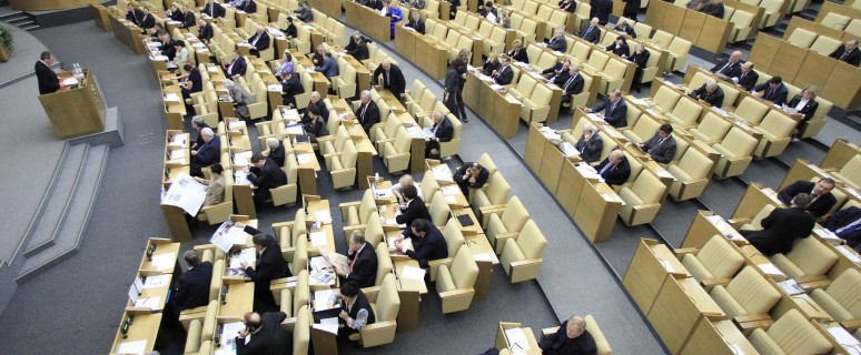 Russia's deputies discuss a nuclear arms reduction pact before the final vote during a session of the lower house of parliament, the State Duma, in Moscow